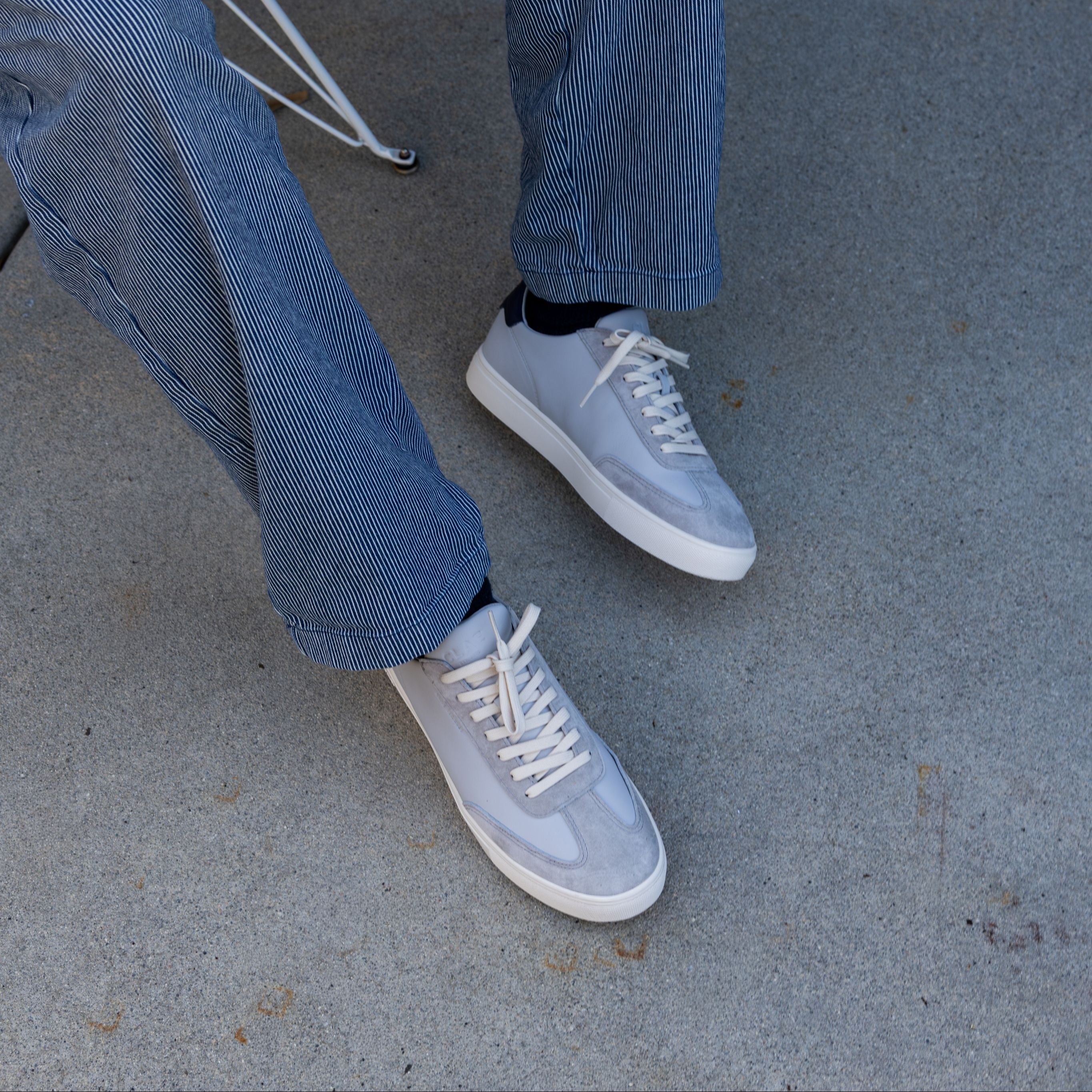 Top view of Deane court shoe in Quiet Gray Navy, showing suede and Italian leather upper with T-Toe design and lace details.