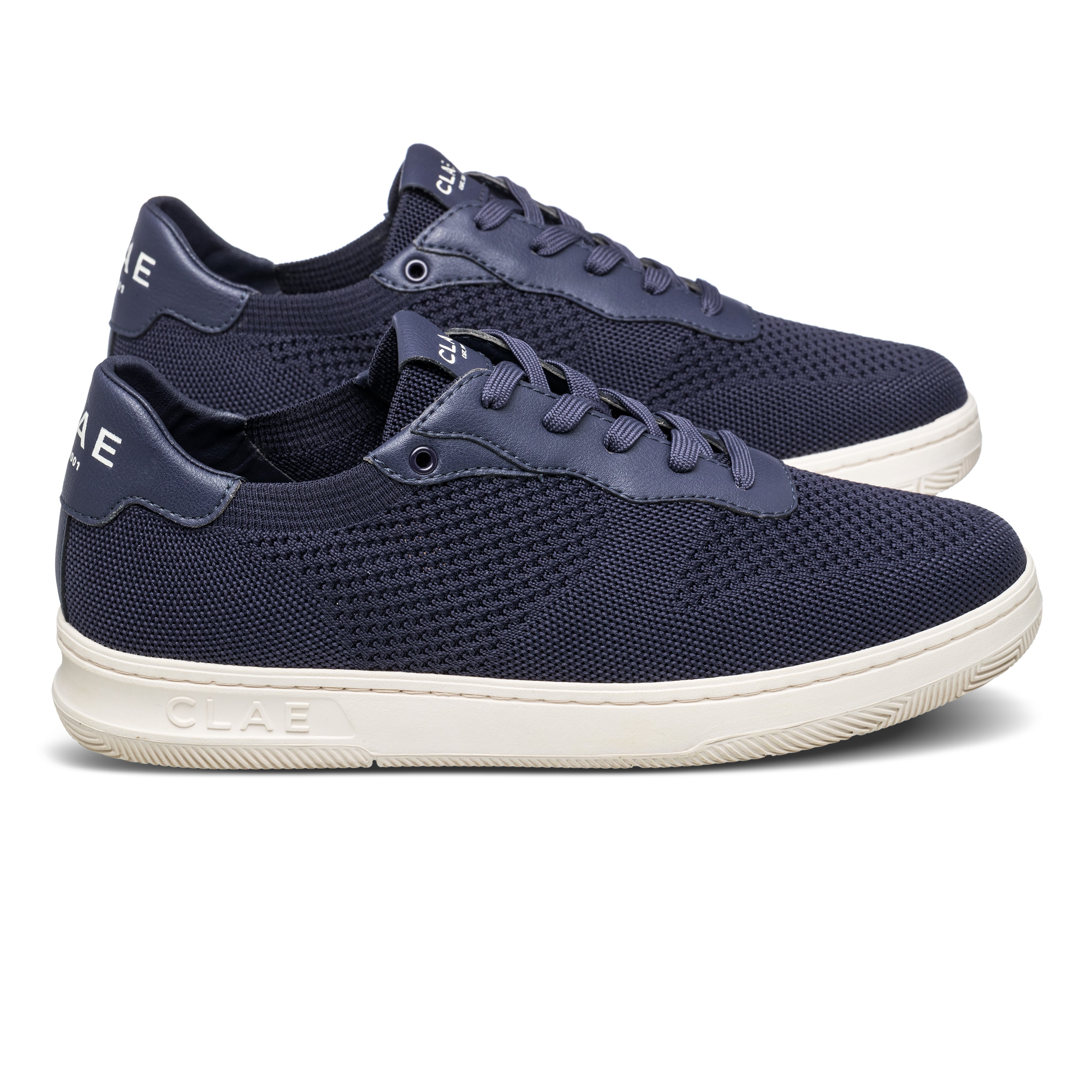 Malone Knit court shoe in Navy SEAQUAL® YARN recycled fiber, side view showing breathable mesh and lightweight design.