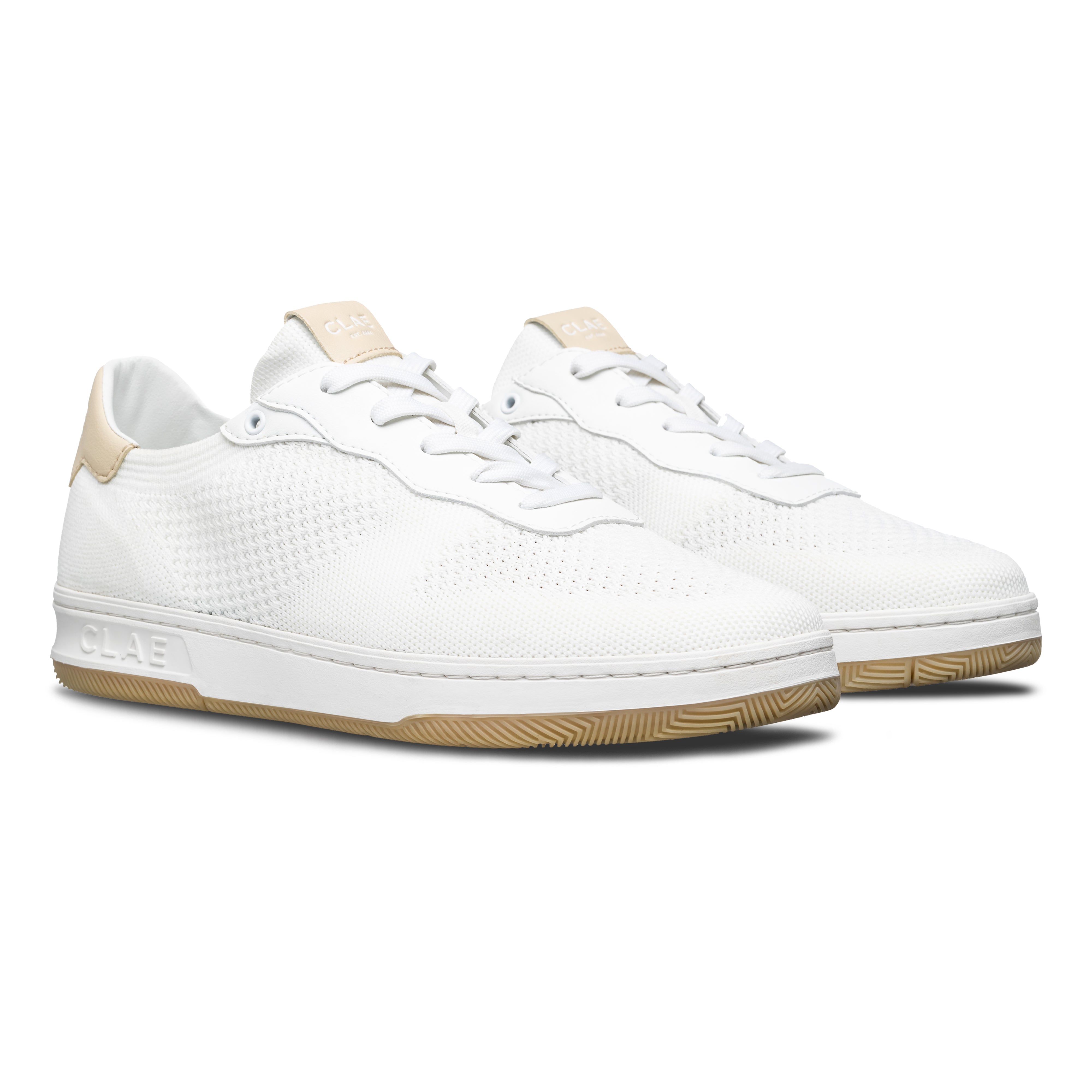 Three-quarter view of Malone Knit shoe, highlighting lightweight recycled fiber construction and sleek court shoe design.