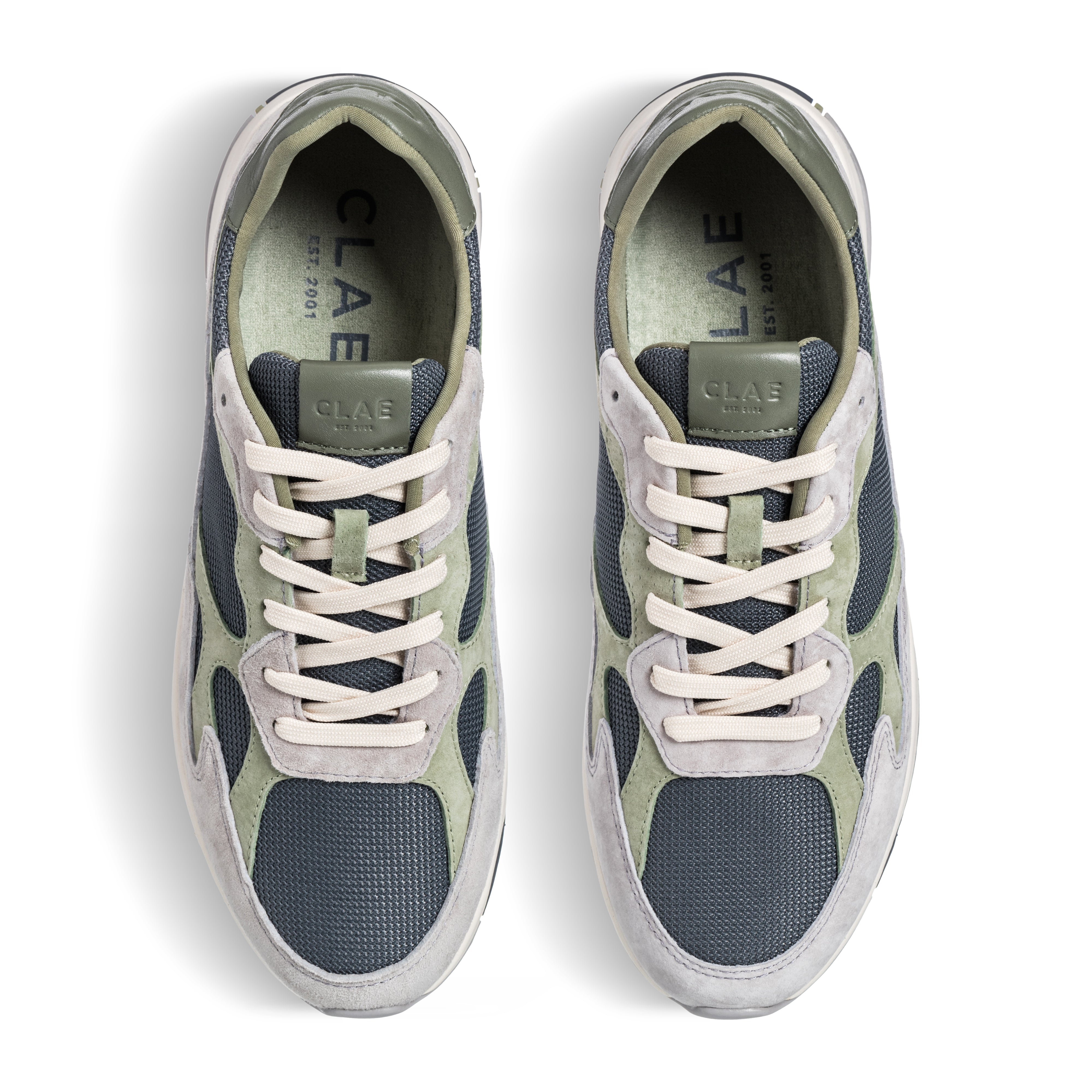 Top view of Zuma runner in Quiet Gray Tea, showing leather, suede, and recycled mesh upper with lace details.