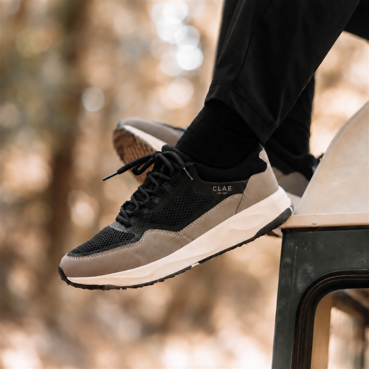 CLAE Milo Black Fallen Rock – lifestyle with black round laces